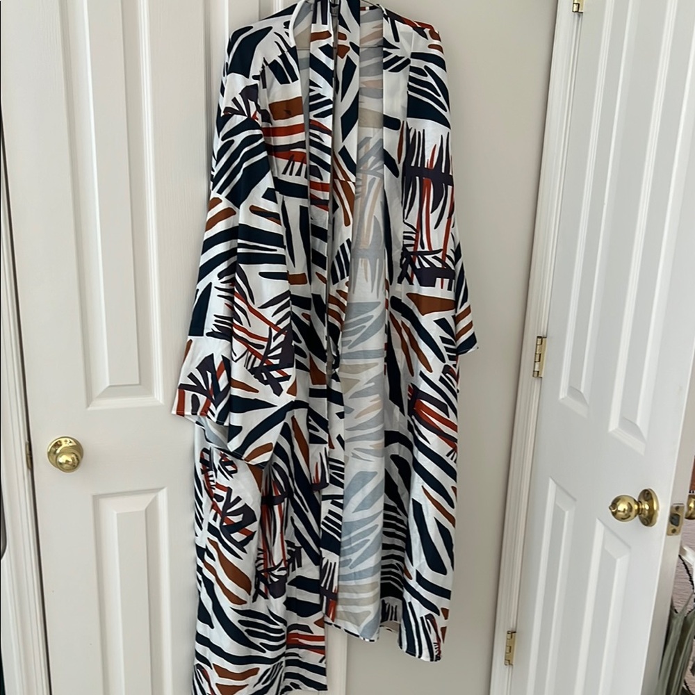 Made by DIARRABLUS. Stylish Multicolor Patterned Kimono wrap belted dress